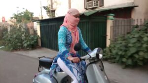 girl riding scooter